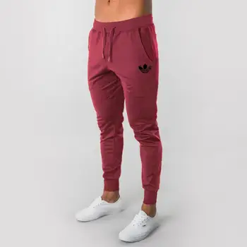 Męskie spodnie fitness wąskie spodnie wiosna elastyczny Kulturystyka spodnie treningowe utwór dolne spodnie mężczyźni casual biegaczy sportowe spodnie