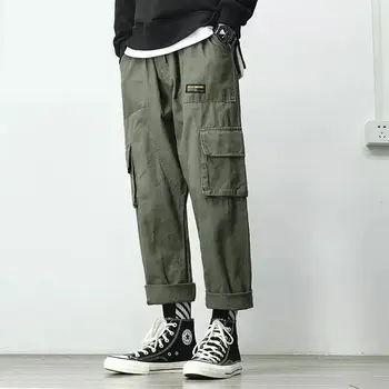 Spodnie cargo mężczyźni uliczny hip-hop spodnie elastyczny pas harem długość do kostek spodnie czarny wojskowy zielony Harajuku luźny codzienny kieszeni