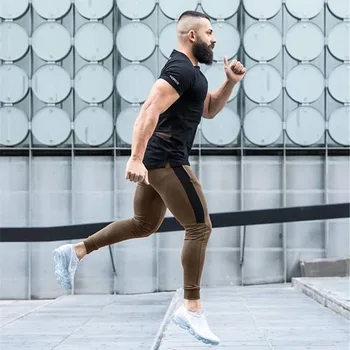 Wysokiej jakości bawełna jogging spodnie mężczyźni jesień siłownia sportowe spodnie mężczyźni odzież sportowa szybkoschnące spodnie biegowe spodnie dresowe fitness