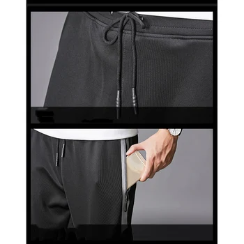 Męskie sportowe spodnie biegacze Męskie spodnie Wąskie kieszonkowe sportowe spodnie plus rozmiar 6XL 7XL 8XL męskie legginsy casual kurtki Spodnie Homme