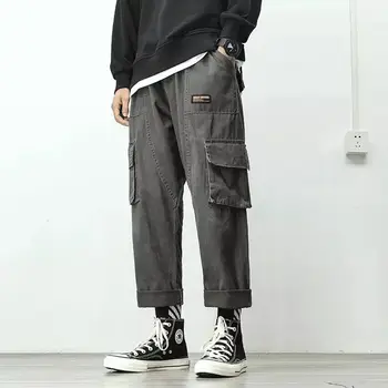 Spodnie cargo mężczyźni uliczny hip-hop spodnie elastyczny pas harem długość do kostek spodnie czarny wojskowy zielony Harajuku luźny codzienny kieszeni
