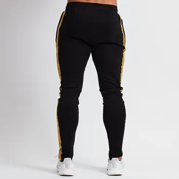 Męskie biegacze sportowe spodnie marki siłownia Kulturystyka spodnie bawełna dorywczo sportowe spodnie łączenie spodnie nowa jesienna odzież Męska