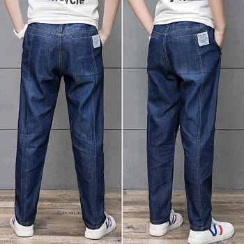 Moda nastolatek chłopcy spodnie czysty kolor jeans niebieskie spodnie dla dzieci elastyczny pas stretch denim odzież od 8 do 16 lat chłopiec odzież